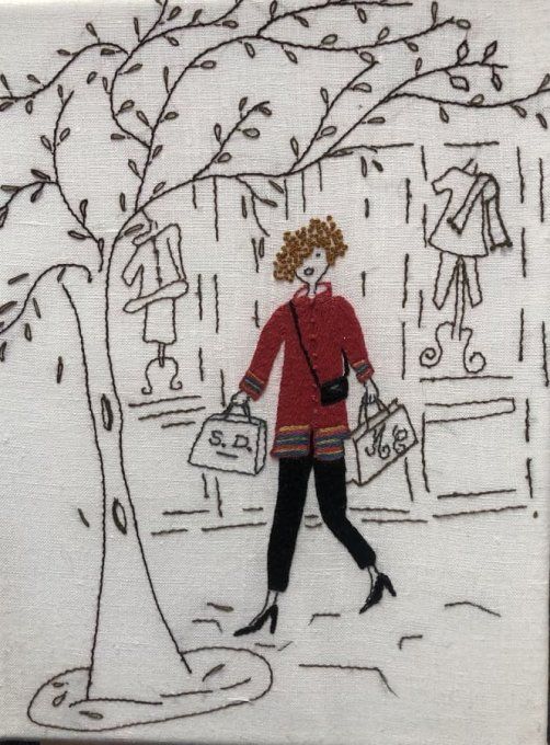 Kit de broderie traditionnelle : 'Mademoiselle fait son shopping en automne'.